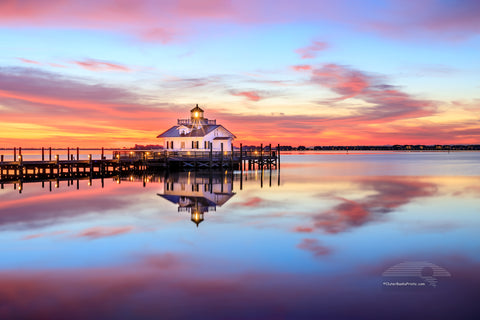 Manteno lighthouse and waterfron sunrise Roanoke Island on the Outer Banks of NC.