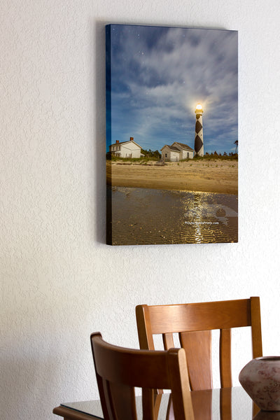 20"x30" x1.5" stretched canvas print hanging in the dining room of Late afternoon clouds forming over Cape Lookout Lighthouse on the Core Banksof NC.