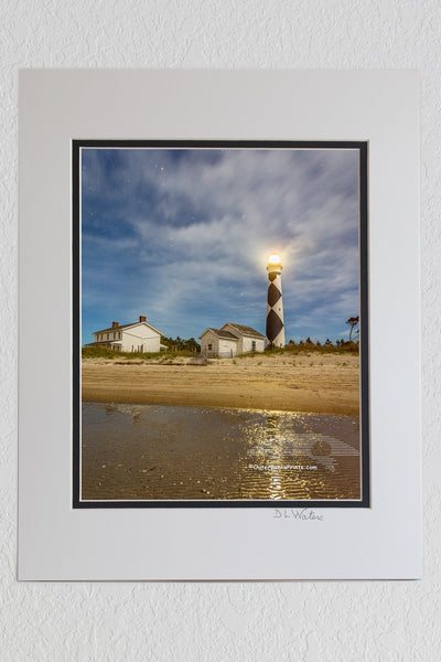 8 x 10 luster print in a 11 x 14 ivory and black double mat of Late afternoon clouds forming over Cape Lookout Lighthouse on the Core Banksof NC.