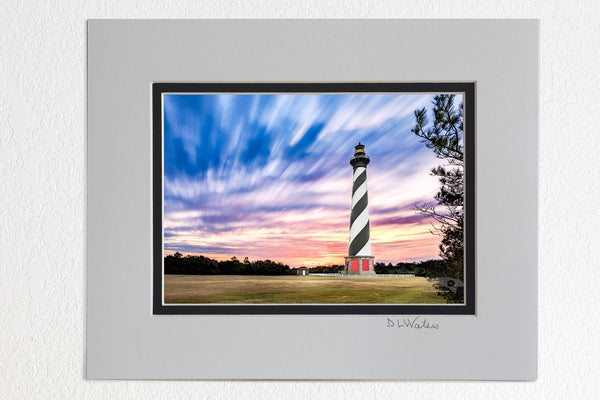   5 x 7 luster prints in a 8 x 10 ivory and black double mat of A long exposure of clouds and Cape Hatteras Lighthouse on the Outer Banks of NC.