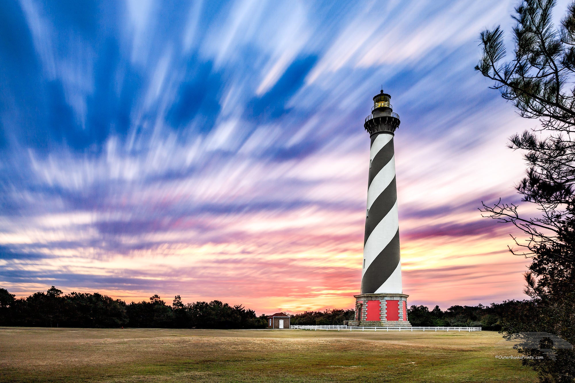 A long exposure of clouds and Cape Hatteras Lighthouse on the Outer Banks of NC.