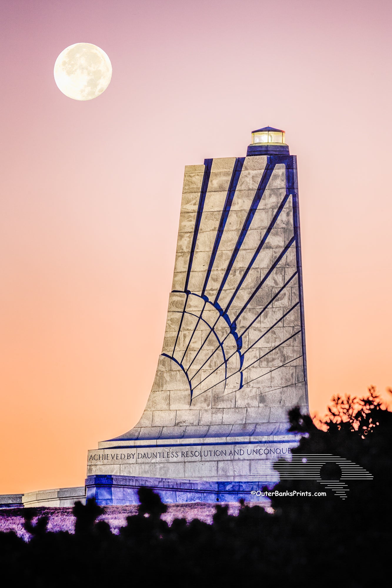 Moon over the Wright Brothers Memorial before sunrise on the Outer Banks, NC.