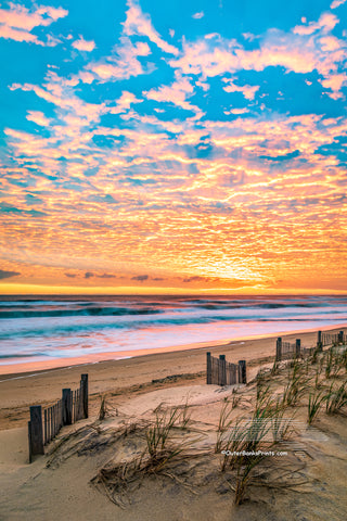 A beautiful sunrise over Kitty Hawk Beach on the Outer Banks of NC.