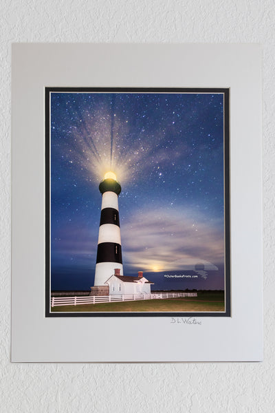 8 x 10 luster print in a 11 x 14 ivory and black double mat of Bodie Island Lighthouse at night with stars and moon on the Outer Banks of NC