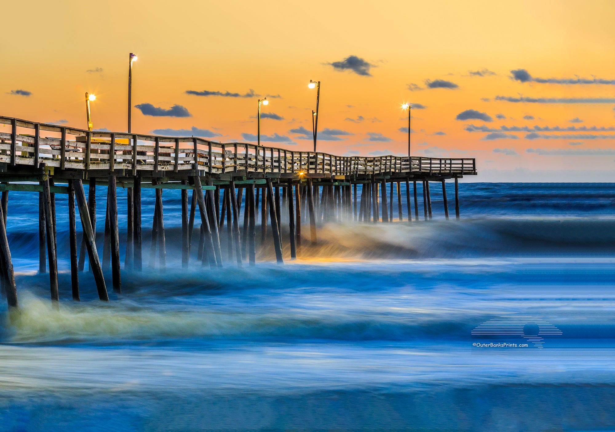 Sunrise with large surf at the Outer Banks Fishing Pier in South Nags Head.