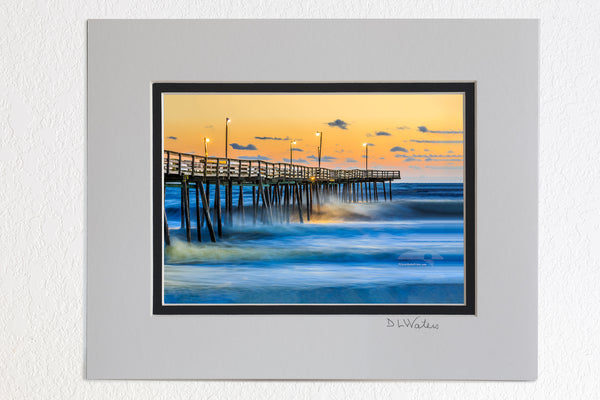 5 x 7 luster prints in a 8 x 10 ivory and black double mat of Sunrise with large surf at the Outer Banks Fishing Pier in South Nags Head.