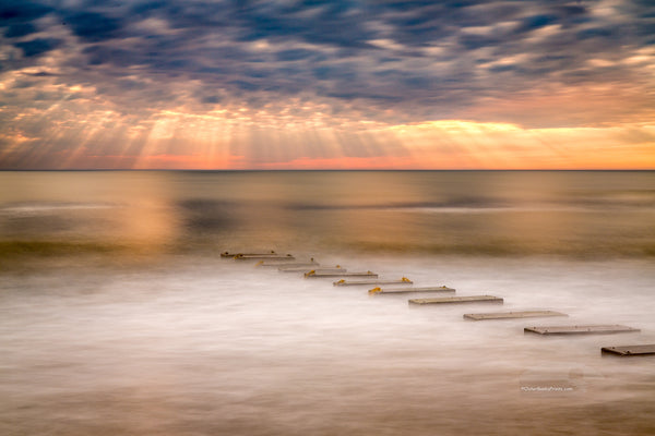 Long exposure of an amazing sky and a drainage outflow in Nags Head on  the Outer Banks of NC.