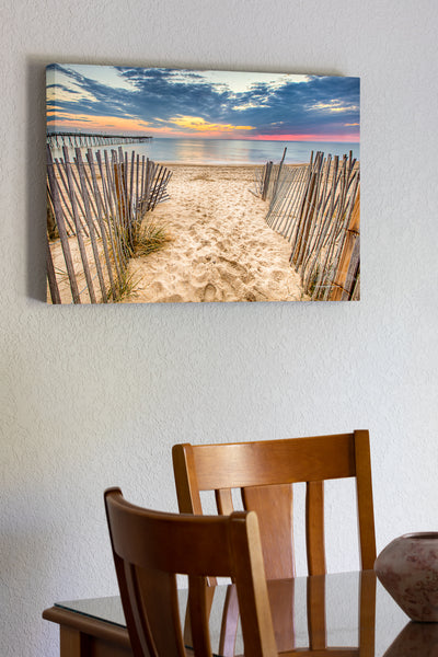 20"x30" x1.5" stretched canvas print hanging in the dining room of Sand fence at Avalon Fishing Pier.  Edit alt text