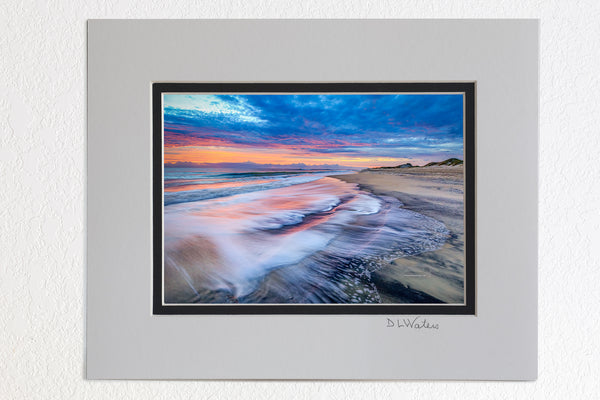 5 x 7 luster prints in a 8 x 10 ivory and black double mat of  Colorful sunrise over surf at Coquina Beach in Cape Hatteras National Seashore on the Outer Banks of NC.