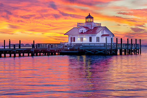 A fabulous sunrise at Roanoke Marshes Lighthouse on Shallow Bag Bay in Manteo North Carolina.