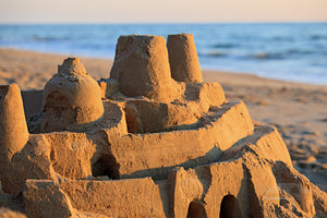 Elaborate sand castle at sunrise on a Outer Banks beach.