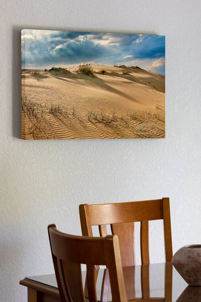 20"x30" x1.5" stretched canvas print hanging in the dining room of Sand dunes and dramatic clouds at Jockey's Ridge State Park Nags Head NC. I Jockys Ridge is the largest sandune on the east coast.