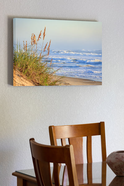 20"x30" x1.5" stretched canvas print hanging in the dining room of Sunny Cape Hatteras beach morning on the Outer Banks of NC.