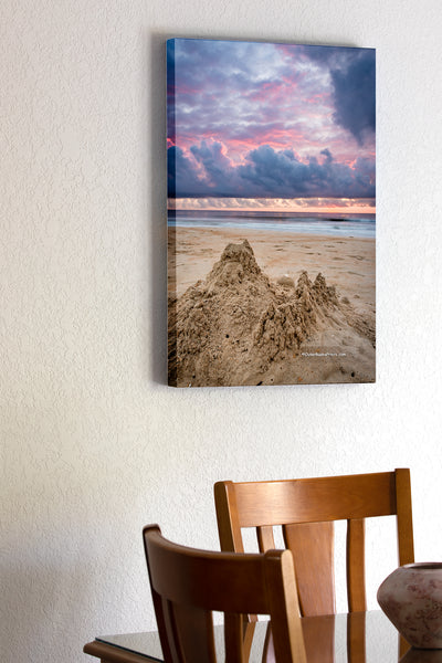 20"x30" x1.5" stretched canvas print hanging in the dining room of Sandcastle beneath an incredible sunrise sky on the Outer Banks of NC.
