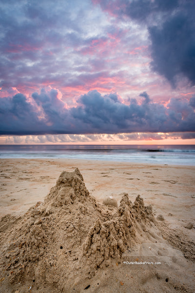 Sandcastle beneath an incredible sunrise sky on the Outer Banks of NC.