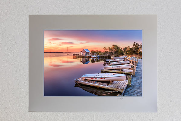 13 x 19 luster print in 18 x 24 ivory ￼￼mat of Sunrise at Shallow Bag Bay waterfront in Manteo on the Outer Banks of NC.