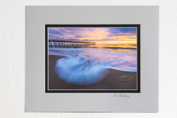 5 x 7 luster prints in a 8 x 10 ivory and black double mat of The surf faning out at the beach in Nags Head with the Nags Head Fishing Pier in the background on the Outer Banks of North Carolina.