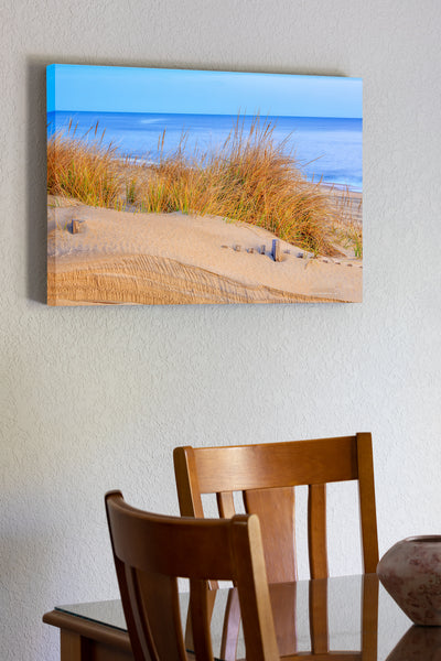 20"x30" x1.5" stretched canvas print hanging in the dining room of Sea oats at sunrise along the Nags Head beach on the Outer Banks of NC.