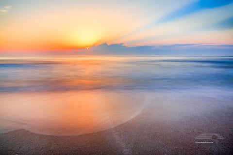 Sunrise over the beach and ocean on the Outer Banks of NC.