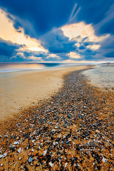 Long exposure of a trail of shell shards washed up on the high tide at Kitty Hawlk Outer Banks beach Christmas morning.