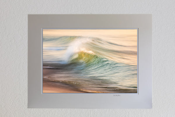 13 x 19 luster print in 18 x 24 ivory ￼￼mat of Impression of motion in the early morning surf on the beach at Kitty Hawk on the Outer Banks of NC.