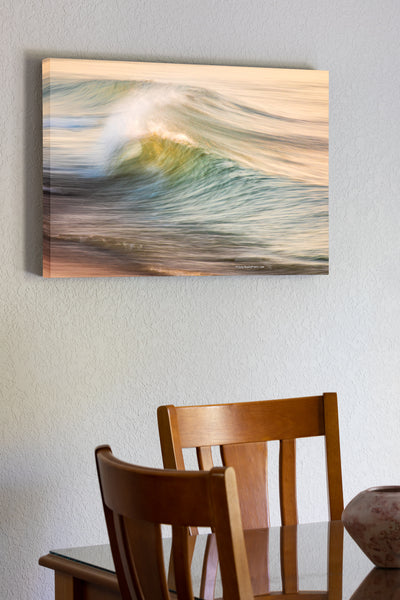 20"x30" x1.5" stretched canvas print hanging in the dining room of Impression of motion in the early morning surf on the beach at Kitty Hawk on the Outer Banks of NC.