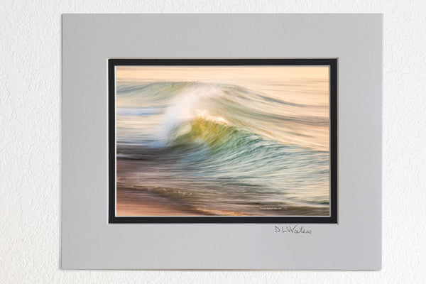 5 x 7 luster prints in a 8 x 10 ivory and black double mat of  Impression of motion in the early morning surf on the beach at Kitty Hawk on the Outer Banks of NC.