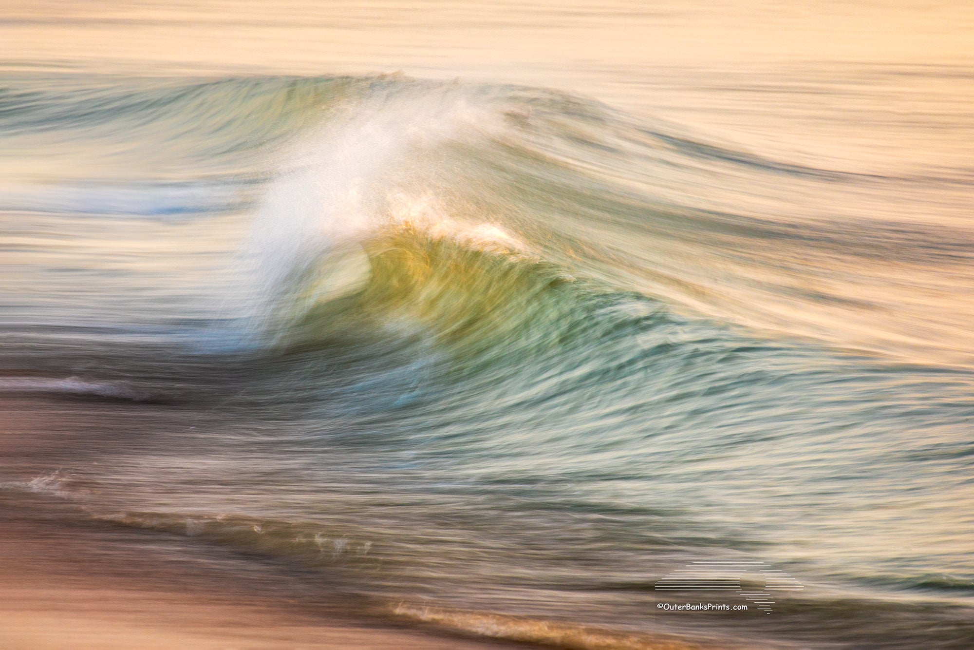 Impression of motion in the early morning surf on the beach at Kitty Hawk on the Outer Banks of NC.