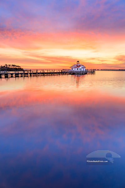 Manteno lighthouse and waterfron sunrise Roanoke Island on the Outer Banks of NC.