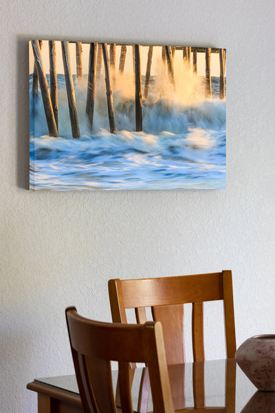 20"x30" x1.5" stretched canvas print hanging in the dining room of A long exposure and crashing waves created this photo of the Outer Banks Pier in South Nags Head.