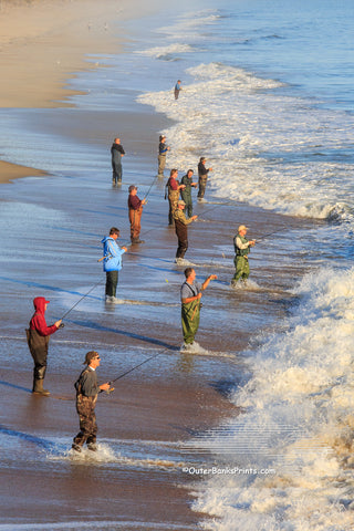 Fishermen line up to catch speckled trout at Kitty Hawk Pier.