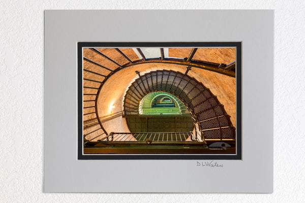 5 x 7 luster prints in a 8 x 10 ivory and black double mat of Looking up at the spiral stairs inside of Currituck Beach Lighthouse. in Corolla, NC on the Outer Banks.
