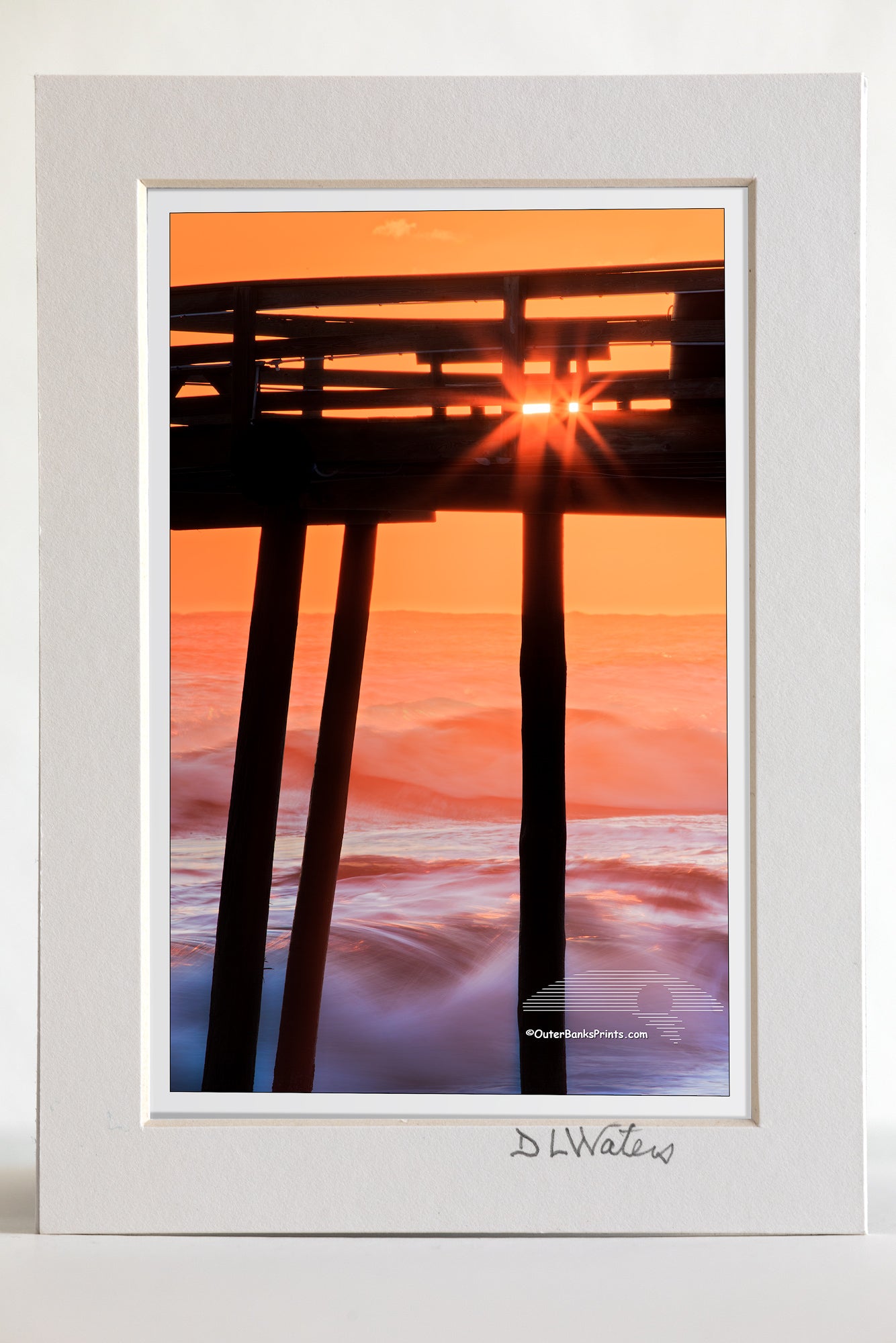 4 x 6 luster print in a 5 x 7 ivory mat of Avalon fishing silhouetted against breaking waves at sunrise.