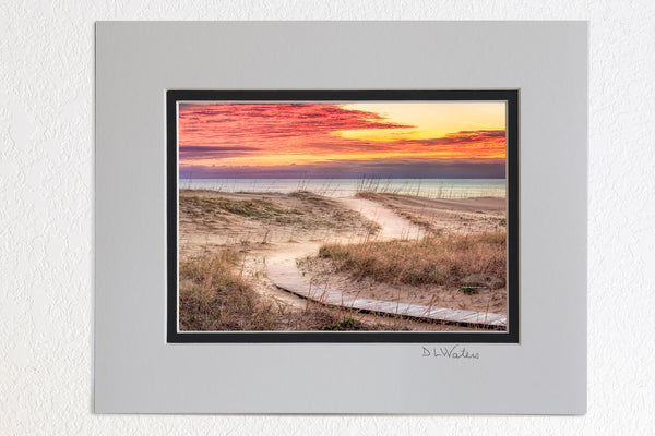 5 x 7 luster prints in a 8 x 10 ivory and black double mat of  Clouds at sunris with a curvy path leading to a Kitty Hawk Beach on the Outer Banks of NC.