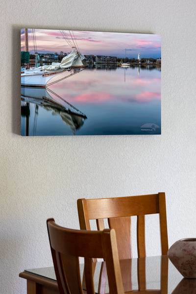 20"x30" x1.5" stretched canvas print hanging in the dining room of Sail boat and reflection at twilight on Silver Lake Ocracoke Island, Outer Banks, NC.