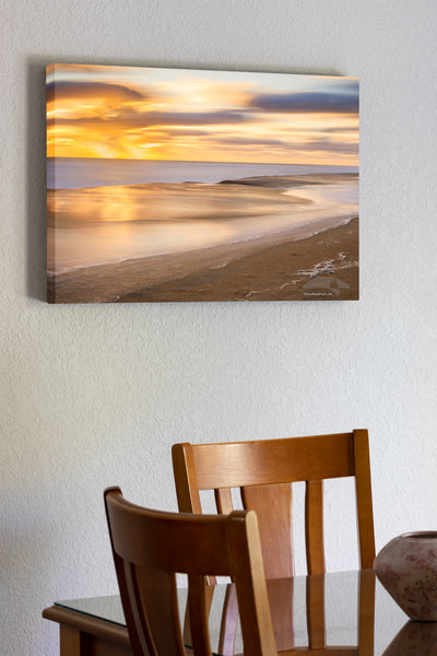 20"x30" x1.5" stretched canvas print hanging in the dining room of Long sunrise exposure at Kitty Hawk beach reflecting in the surf on the Outer Banks of NC.