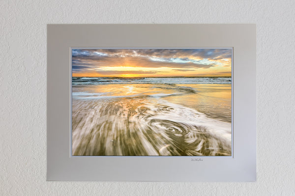 13 x 19 luster print in 18 x 24 ivory ￼￼mat of Cloudy sunrise at Carova Beach on the northern Outer Banks.