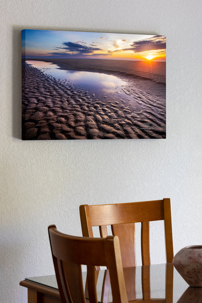20"x30" x1.5" stretched canvas print hanging in the dining room of Sunrise reflection in a tide pool on a Corolla beach at Outer Banks, NC.