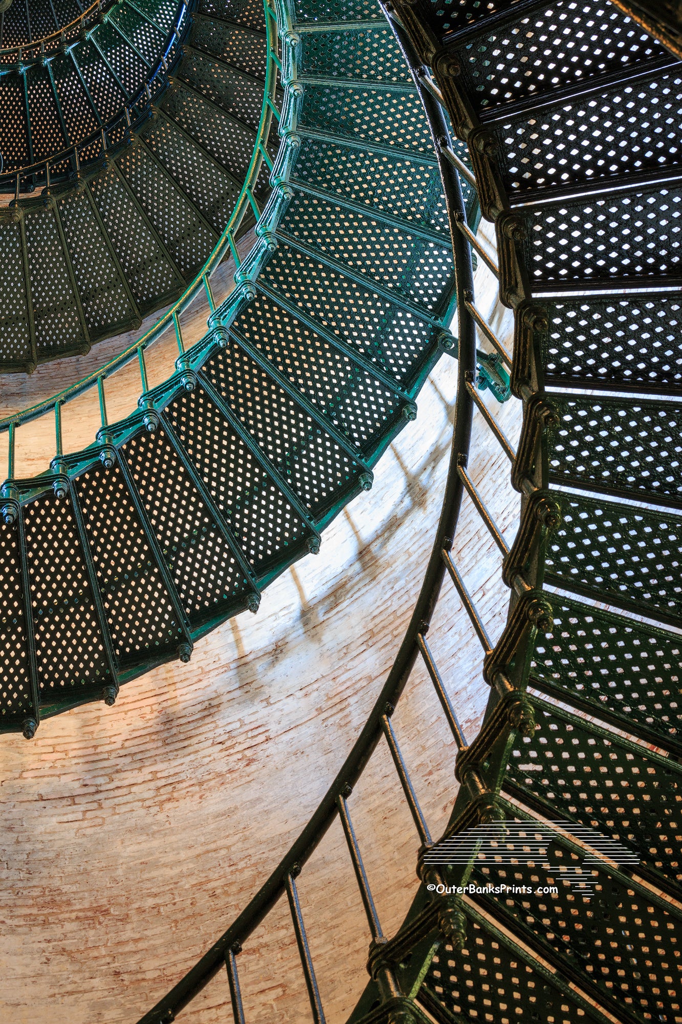 Pattern of spiral staircase inside Currituck Beach Lighthouse in Corolla North Carolina.