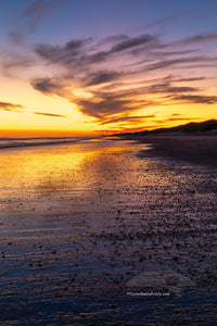 Just after sunset along Frico beach in Cape Hatteras National Seashore. Because the way Cape Point stretches out into the Atlantic ocean Frisco beach is one of the few places on the Outer Banks the sun rises and sets along the beach.