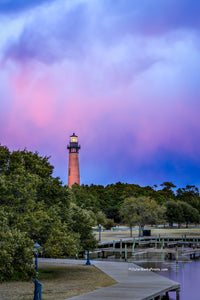 Currituck Beach Lighthouse captured at twilight from the top of the wooden bridge that connects the  Whale Head Club to the lighthouse.