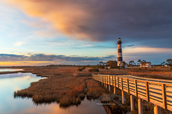 Morning clouds moving in above Bodie Island Lighthouse in Cape Hatteras National Seashore on the Outer Banks of NC.