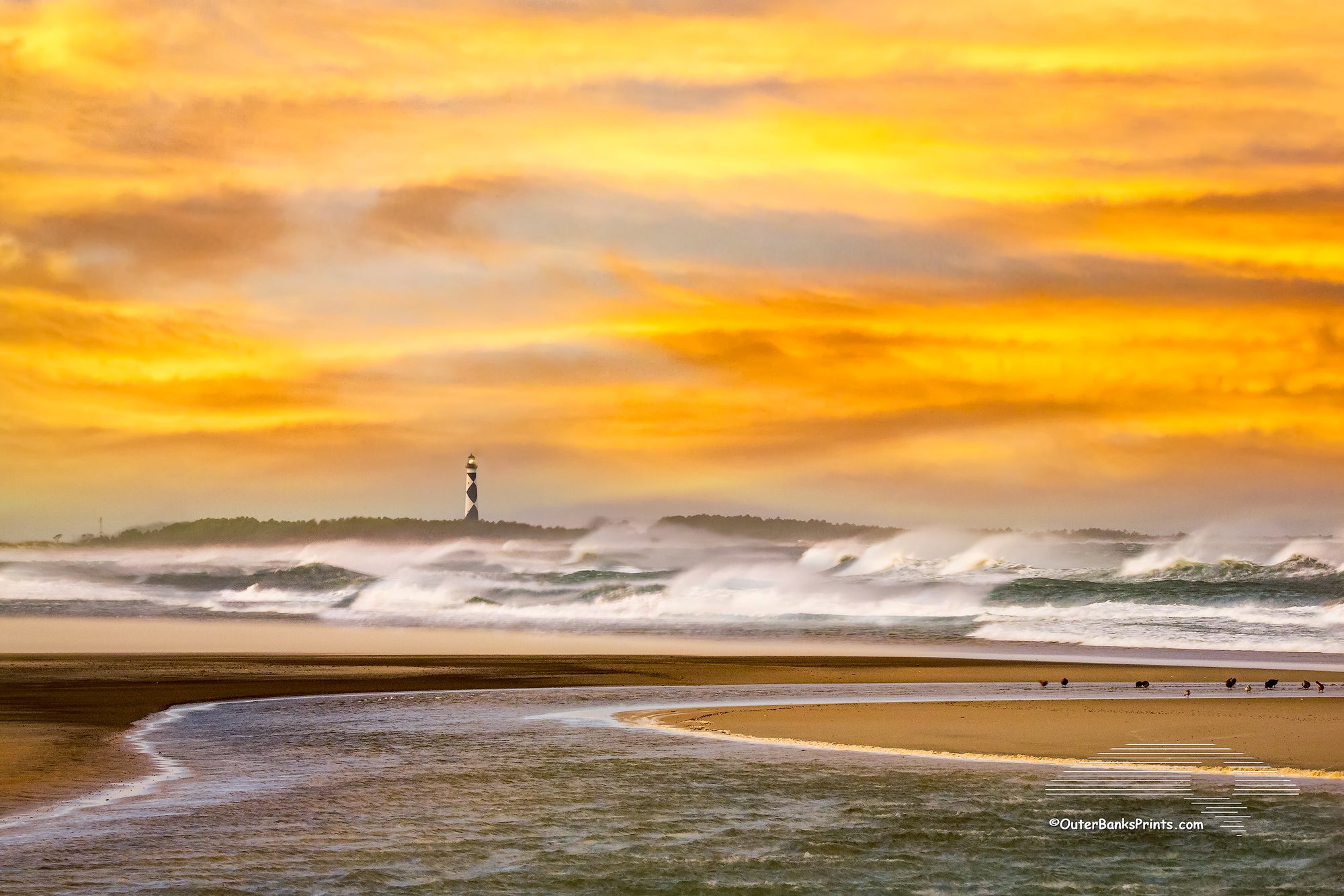 The surf was crashing ashore and the wind was blowing so hard I could hardly stand when I captured this photo looking toward Cape Lookout Lighthouse from Cape Point on the Core Banks in North Carolina.