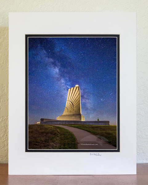 The only way I was able to capture this star filled Milky Way galaxy sky at the Wright Brothers National Memorial in Kill Devil Hills on the Outer Banks of North Carolina was to take two photographs and combine them in Photoshop. The light shining on the memorial is way too bright to capture the memorial and the stars in one exposure.